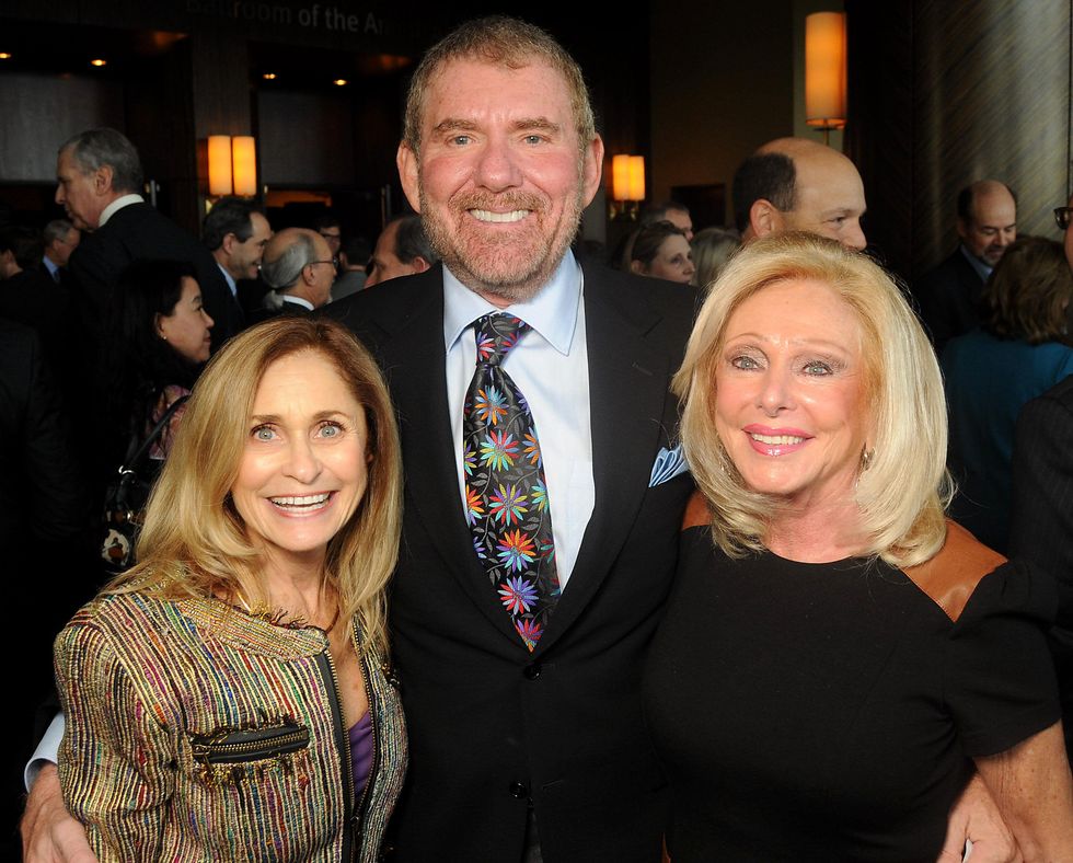 27 Sandy Lessig, from left, and Bruce and Rhona Caress at the Guardian luncheon November 2013
