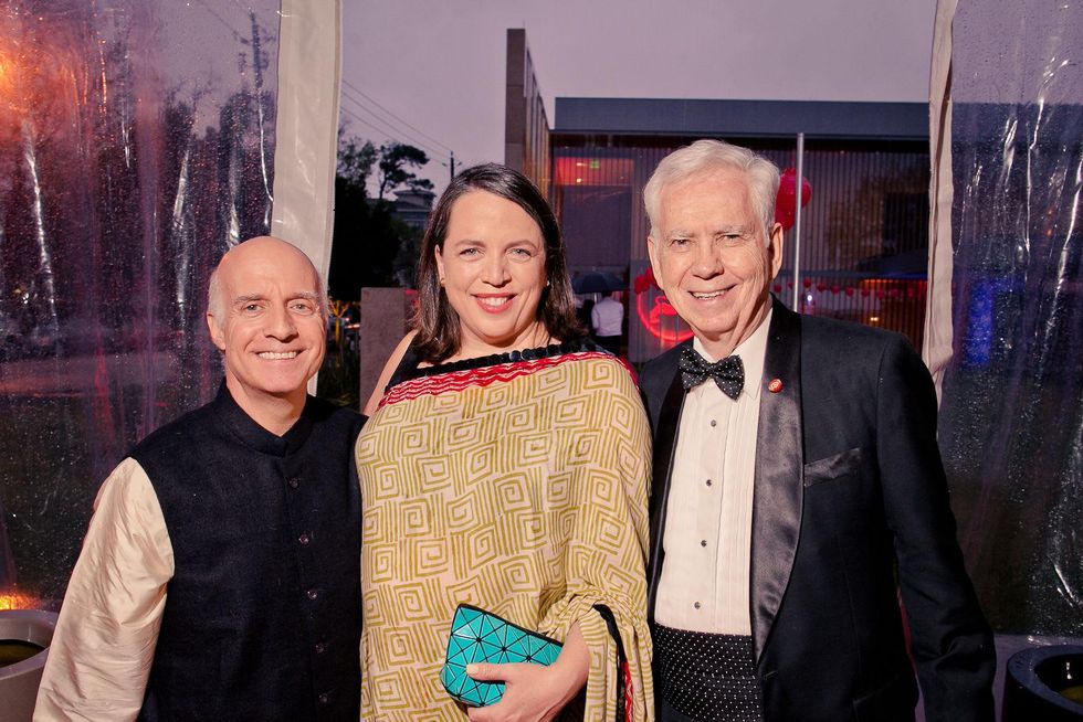28 Jim Falk, from left, Amy Hofland and Charles Foster at the Asia Society Tiger Ball March 2015