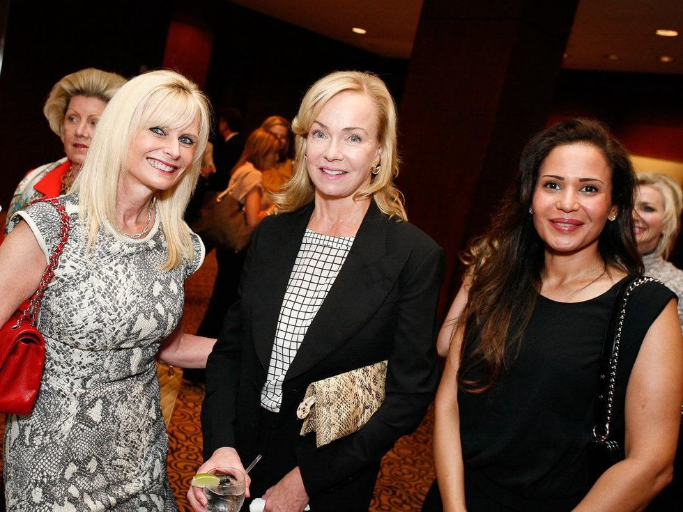 28 Jo Lynn Falgout, from left, Alice Mosing and Lamees Sinders at the Celebration of Champions luncheon October 2013