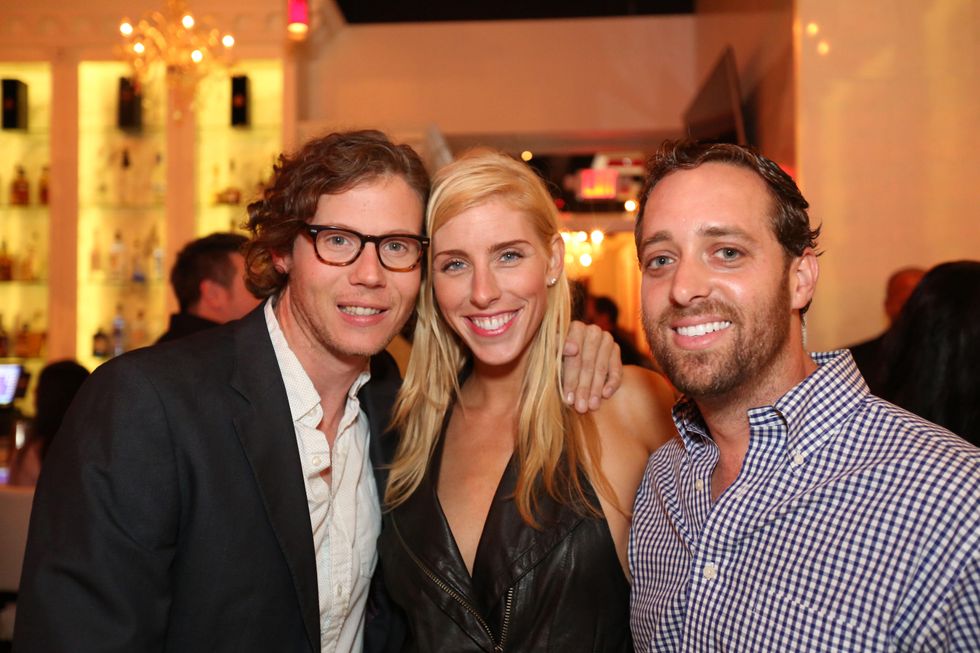 2826 Will Walsh, from left, Lindsey George and Thomas Gribble at the Crimson grand opening party July 2014