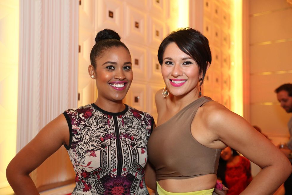 2838 Saba Asfaha, left, and Vanessa Hughes at the Crimson grand opening party July 2014