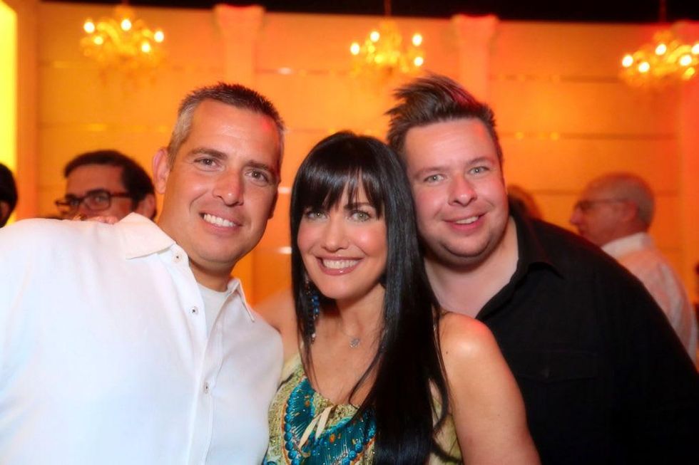 2840 Scott Beverly, from left, Tiffany Halik and Chris Beverly at the Crimson grand opening party July 2014