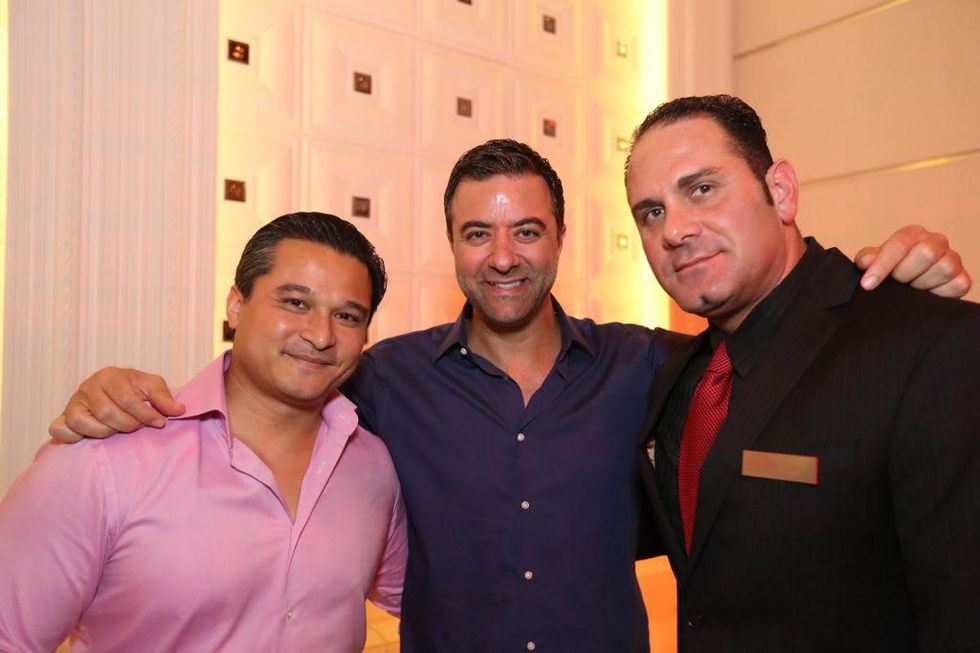 2878 Juan Cao, from left, George Hermes and Joe Arbeely at the Crimson grand opening party July 2014