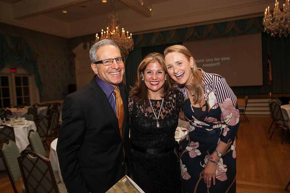 29 Rick Wester, from left, Libbie Masterson and Bevin Dubrowski at the Houston Center for Photography Print Auction February 2014
