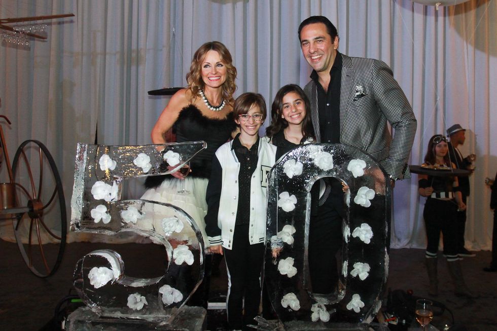 297 Lucinda Loya, from left, NAME, NAME and Javier Loya at Lucinda Loya's birthday celebration February 2014