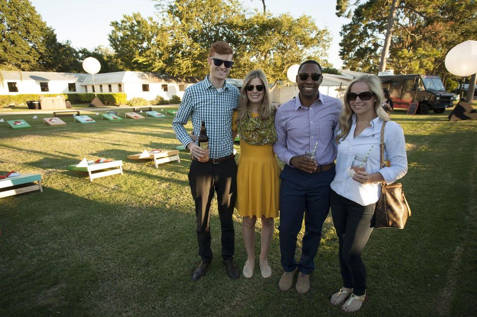 3 David Lynn, from left, Monica Slusser, Kate Champion and McStephen Dadzie at the Toss for Texas Children's Hospital October 2014
