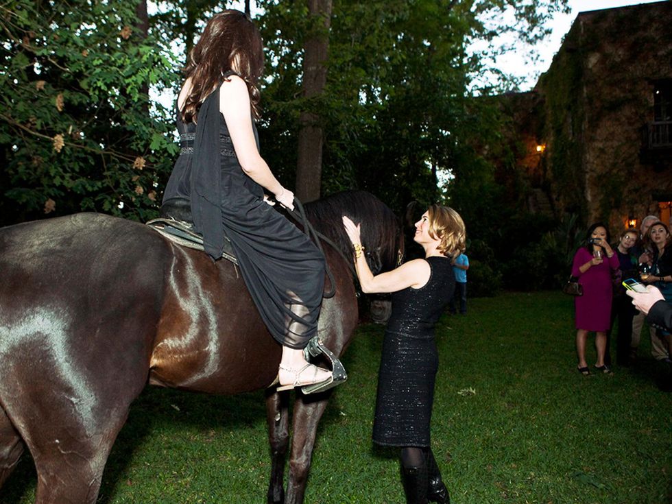 3 Deborah Elias My Favorite Things May 2013 Blaffer Art Museum Director and Chief Curator Claudia Schmuckli interacts with the surprise performer riding a black stallion