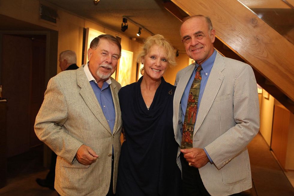 3 Jan Victor Bordoff, from left, with Elizabeth Nelson Davia and Renato L. Davia at the Meredith Long Kenneth Noland opening September 2014