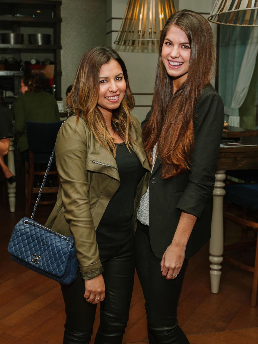 3 Mishelle Echeverria, left, and Jordan Newman at the CultureMap Social at Saint Genevieve October 2013