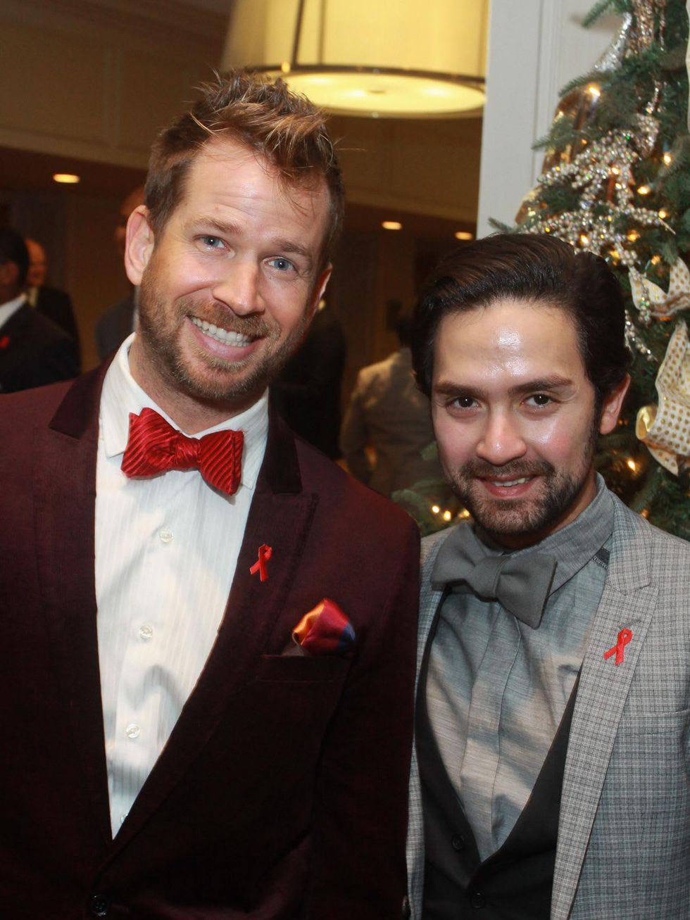 30 Jeff Shell, left, and Tarek Elbjeirmi at the World AIDS Day luncheon.