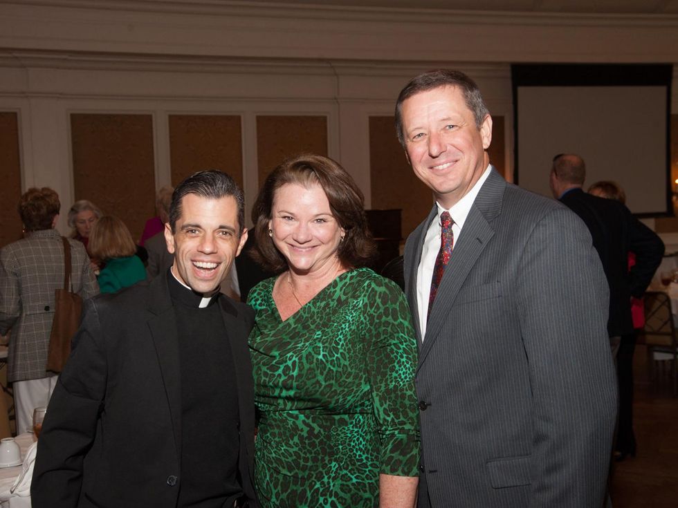 319 T.J Martinez, from left, with Tara and David Wuthrich at Family Services 110th anniversary