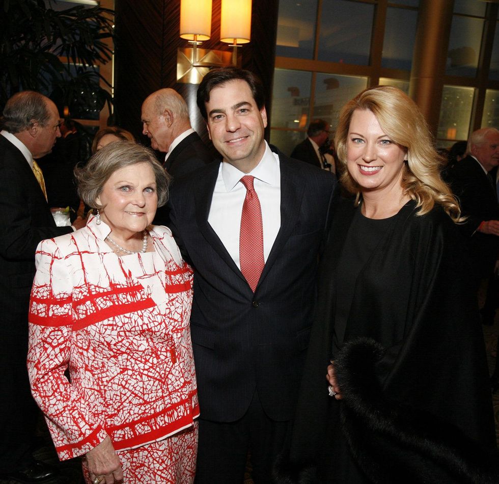 32 Carolyn Light, left, with John and Kim Klevenhagen at An Evening with a Legend February 2015