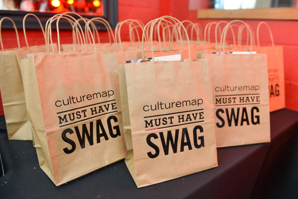 33 CultureMap "Must Have Swag" bags at the CultureMap Social at Boheme September 2014