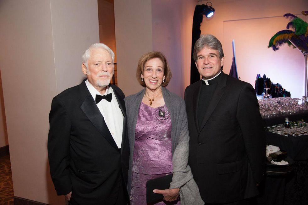 35 Dr. Malcolm and Elizabeth Gillis, left, with Frank Rossi at the Eye Ball February 2015