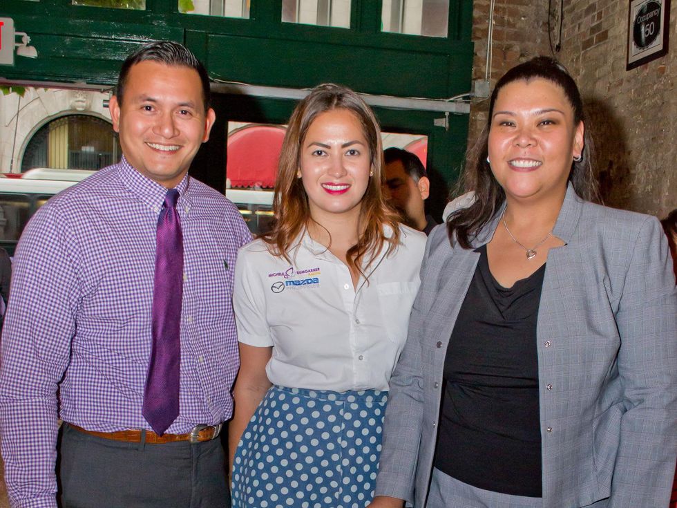 37 Derek Mendoza, from left, Michele Bumgarner and Juvie Cruz, President of Filipino Young Professionals of Houston (FYP Houston) at the Young Professionals Grand Prix kick-off party June 2014