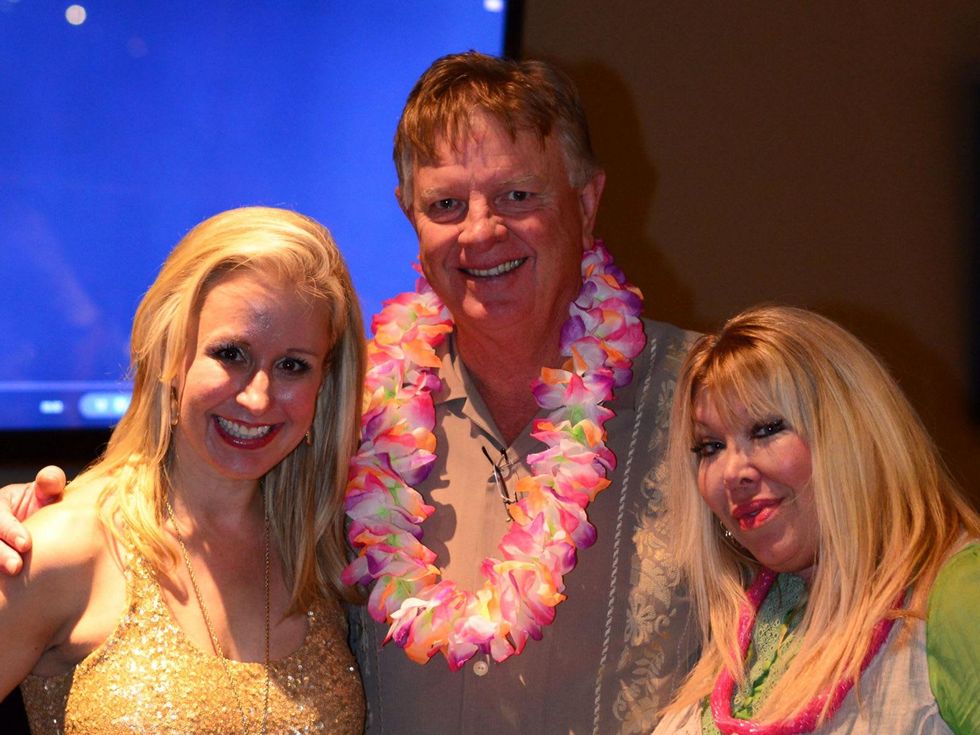37 our 33 Jennifer Brown, from left, Larry Dierker and Lara Bell at the Literacy Advance Reader Cup February 2014