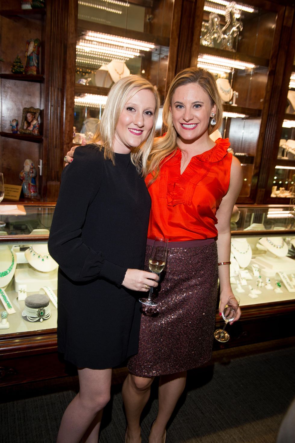 38-1 Erin Ivy, left, and Alexis Caruselle at the Valobra Pin Oak holiday party December 2014