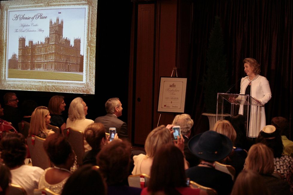 39 Lady Carnarvon shares the history of Highclere Castle with guests at the Highclere Tea March 2015