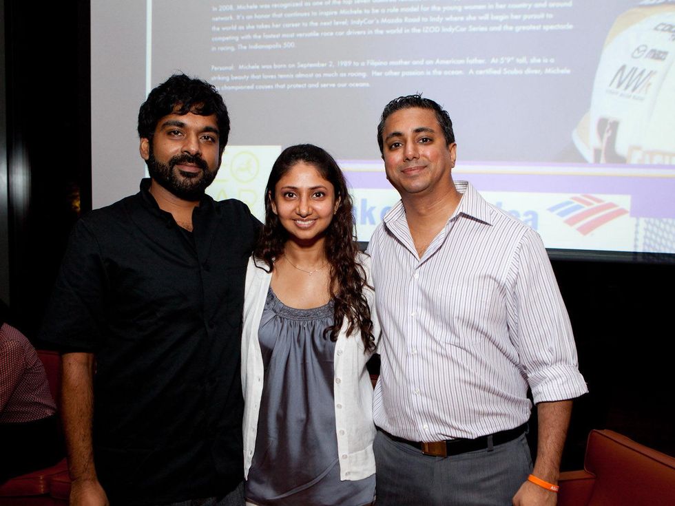 398 Rishi Singh, left, with Poonam and Jagdeep Chadha at the Leo Bar relaunch party October 2013