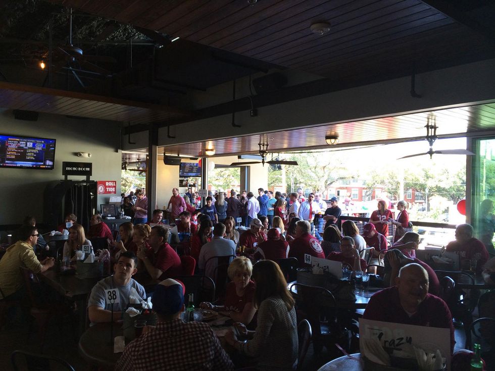 4 Alabama crowd in venue at the Alabama vs. Auburn Iron Bowl Block party Houston December 2013