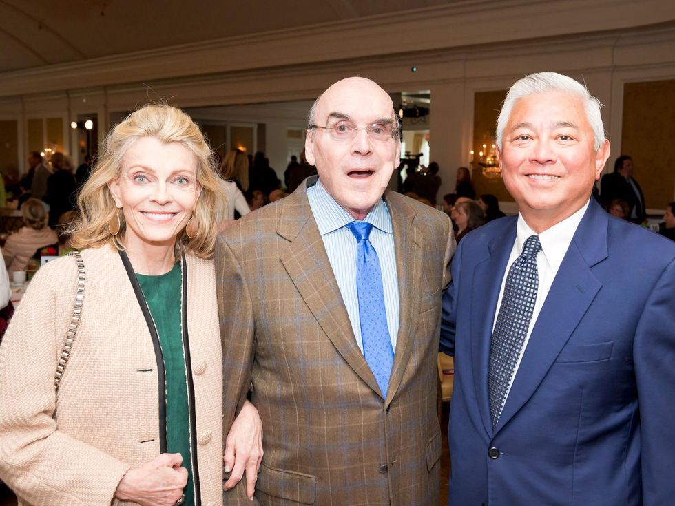 4 Alice and Philip Burgieres, from left, and Michael Jhin at the Aphasia Recovery Center luncheon March 2014