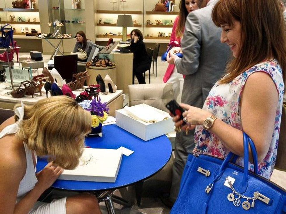 4 Charlotte Olympia shoe designer April 2013Charlotte autographing shoes for Donae Chramosta