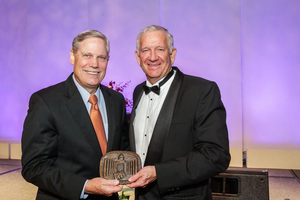4 Corbin Robertson, left, and Dr. Robert Sloan at the Houston Baptist University Lou Holtz dinner November 2014