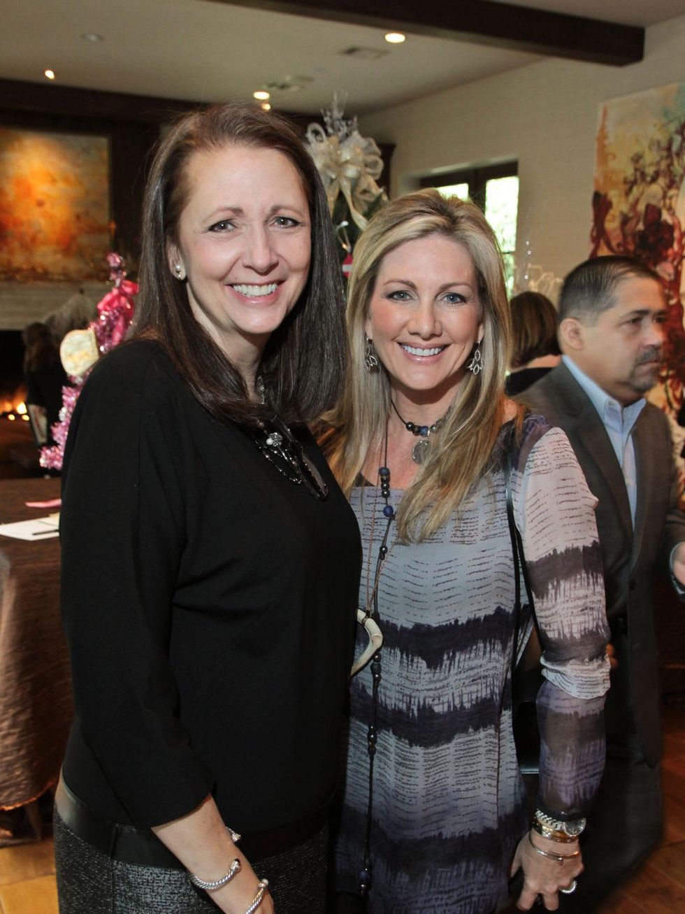 4 Elaine Stolte, left, and Anne Carl at The Children's Assessment Center Holiday Coffee December 2013
