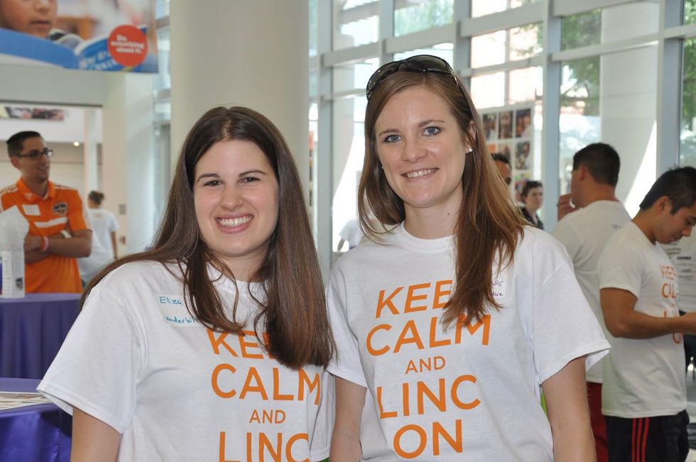 4 Eliza Horn, left, and Ashton Becker at young professionals build Tiny Libraries September 2014