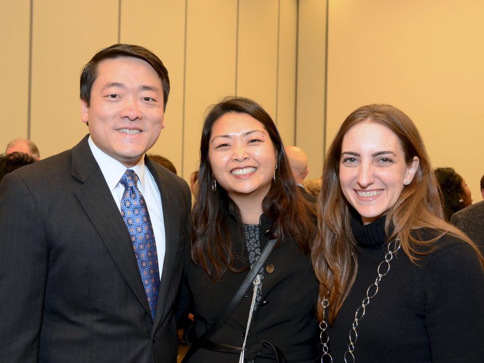 4 Gene Wu, from left, Julie Evans and Kristen Brauchle at the mayoral inauguration reception at the Houston Food Bank January 2014