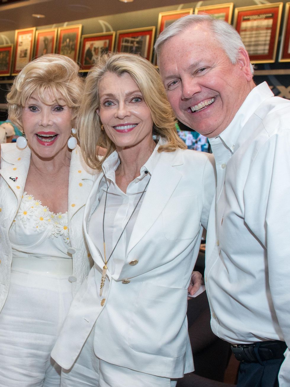 4 Joanne King Herring, from left, Alice Burguieres and John Havens at the Houston Texans Owner's Suite party at NRG Stadium September 2014