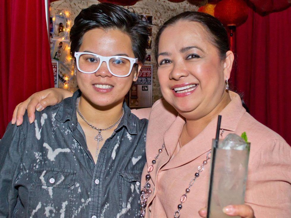 41 Maria Canlas, left, and Tess Tuazon, Regional Chair for Philippine-American Chamber of Commerce (PACC) at the Young Professionals Grand Prix kick-off party June 2014