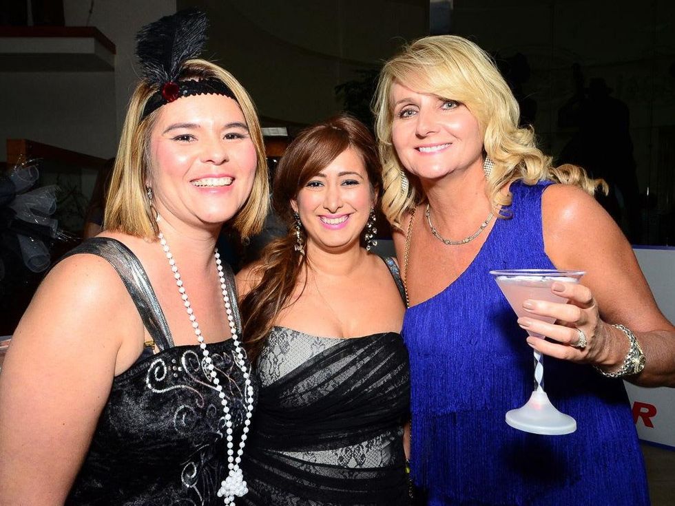 44 Thalia Guderyon, from left, Vita Provenzano and Rachelle Lee at the Fellas and Flappers Sunshine Kids event October 2013