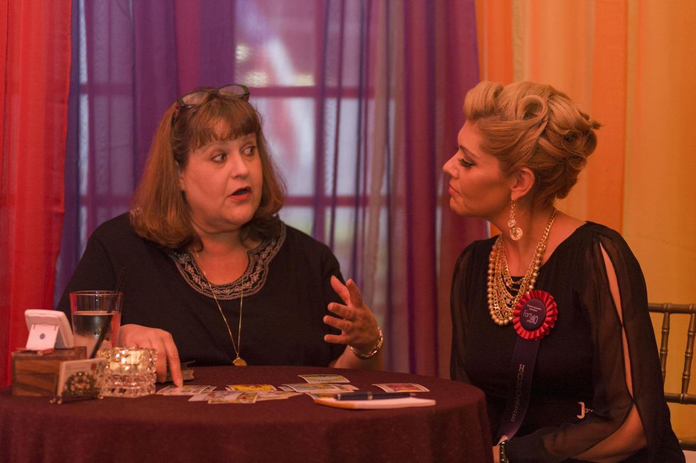 45 Fortune Teller Joelle of Enlightened Spiritual Solutions gives a reading to Veronica "Vee" Mier at the HAA inaugural 40 under 40 party September 2014