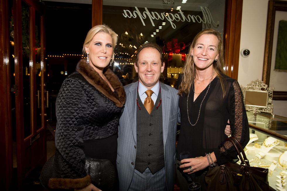 47 Courtney Hopson, from left, Franco Valobra and Hollis Grace at the Valobra Pin Oak holiday party December 2014