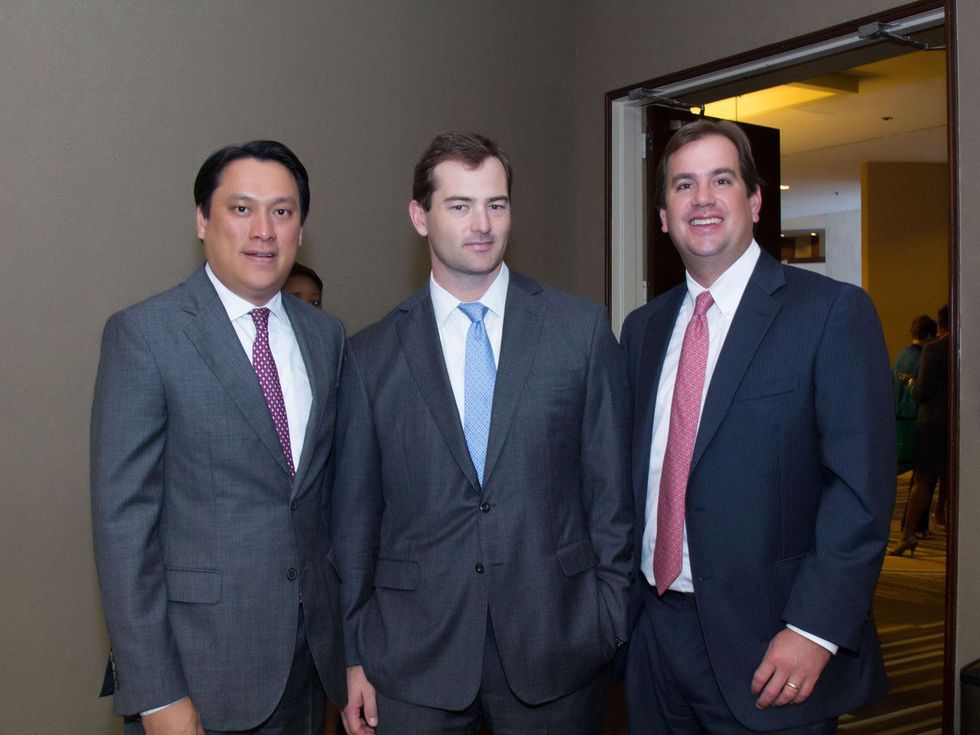 4960 Thanh Roettele, from left, Patrick McWilliams and Greg Mendez at the Career and Recovery Luncheon July 2014