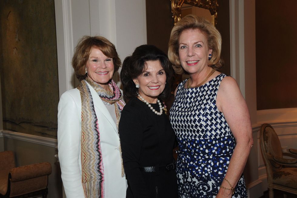 5 Carolyn Young, from left, Linda McReynolds and Elise Joseph at the Assistance League luncheon October 2014