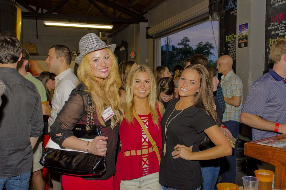 5 Lauren Scotton, from left, Stacey Tyler and Mackenzie Haltom at the Bear Bryant Awards young professionals party October 2014