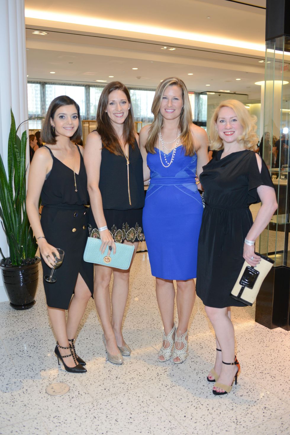5 Layla Asgari, from left, Beth DeLozier-Hayes, Bethany Buchanan and Holly Wilkison at the WOW Summer Soiree August 2014