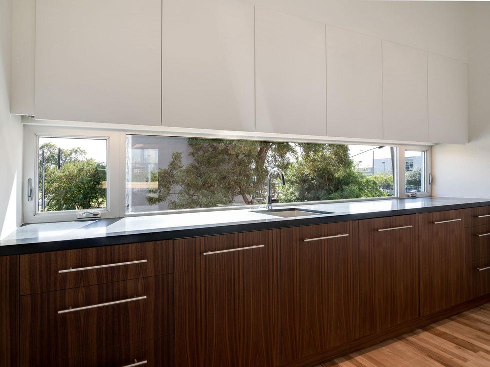 5 On the Market 3000 Hawkins St. December 2014 kitchen cabinet and sink Nov 3rd reshoot-7