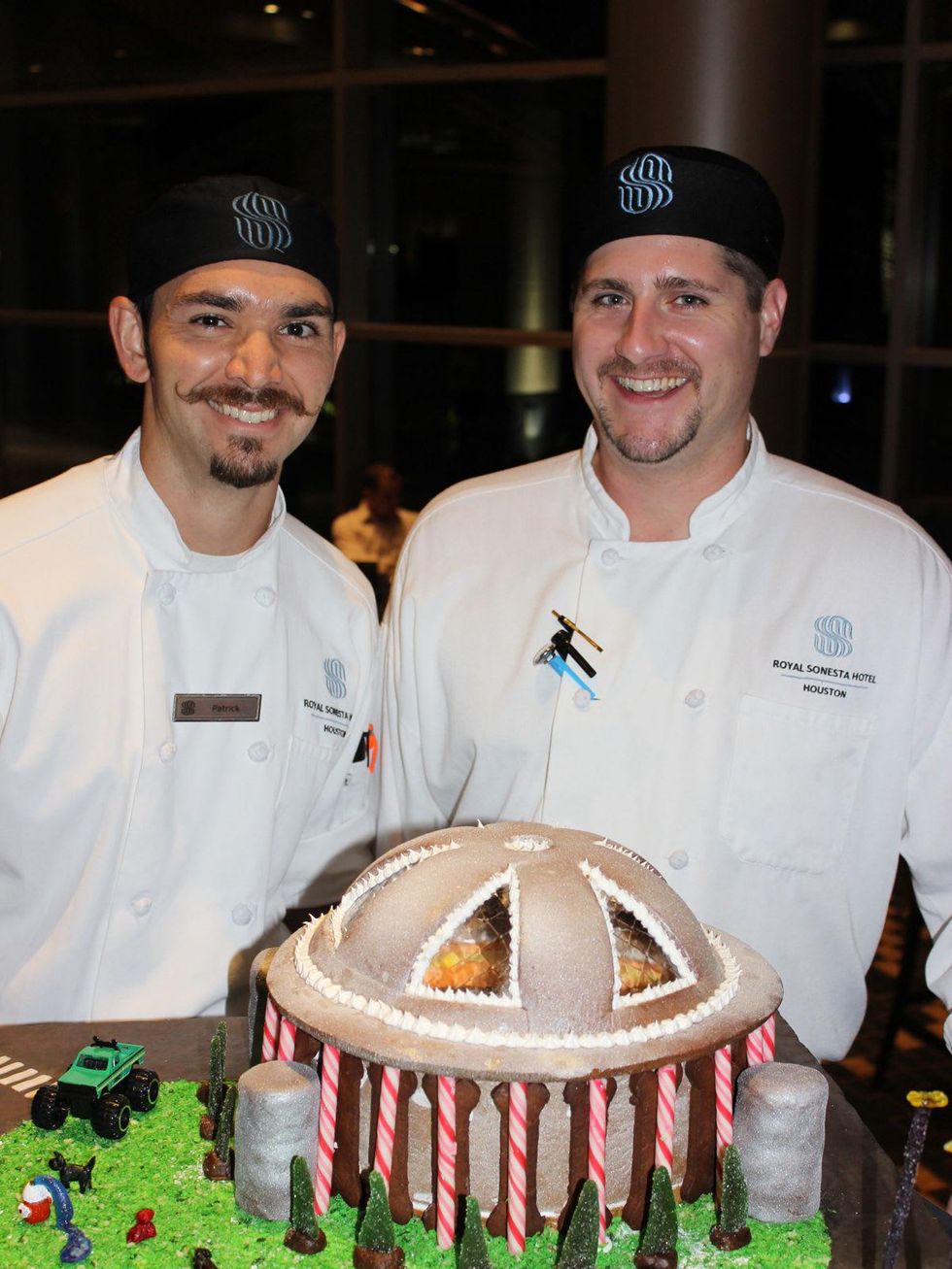 5 Patrick Escobar, left, and Seth Couter at the Lucky Dog Gingerbread Doghouse event December 2013