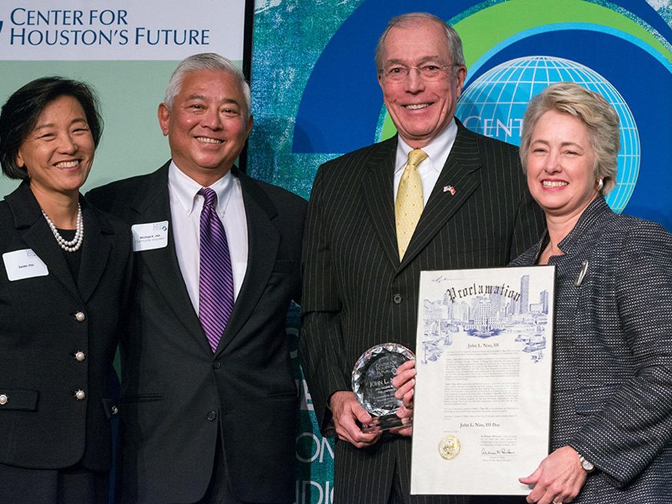 5 Susan and Michael Jhin, from left, John Nau III and Mayor Annise Parker at the Future of Leadership luncheon April 2014