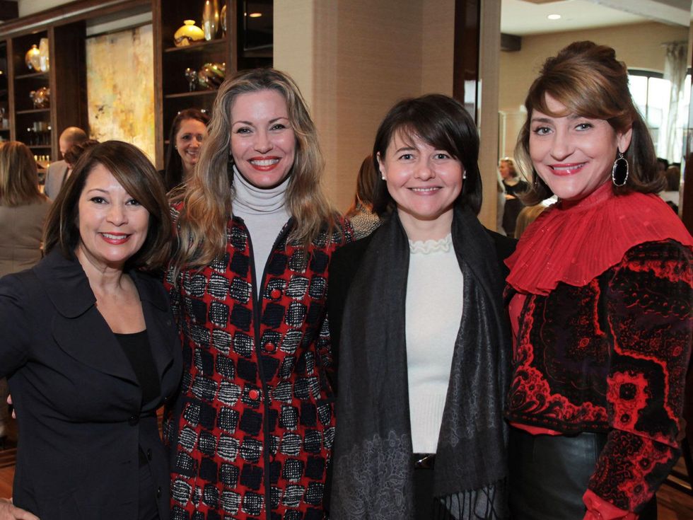 5 Yvette Webb, from left, Tina Davis, Lidiya Gold and Denise Hazen at The Children's Assessment Center Holiday Coffee December 2013