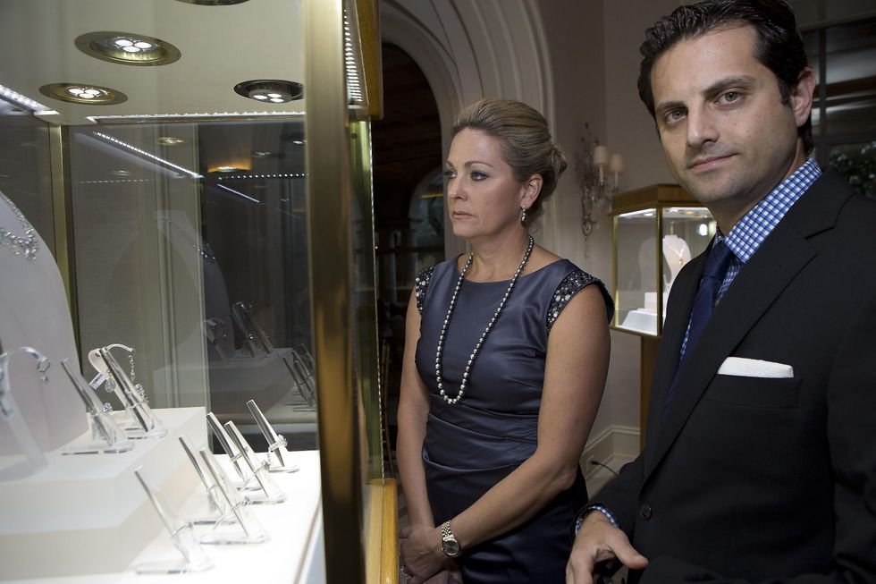 53 Observing the jewelry at the Zadok jewelry dinner November 2014