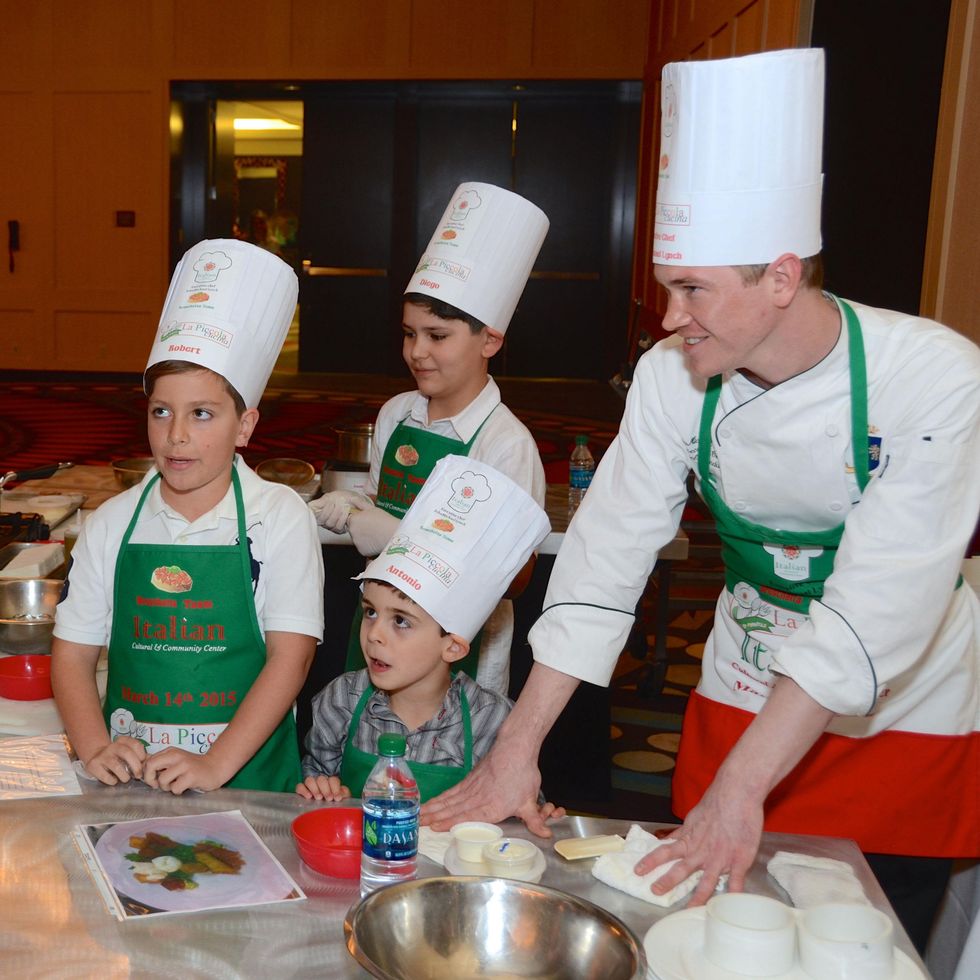 53 The Bruschetta Team, from left, Robert Wood, Antonio Vetrini and JohnMicheal Lynch and Diego Sarmiento at Tutti ai Fornelli de La Piccola Cucina March 2015
