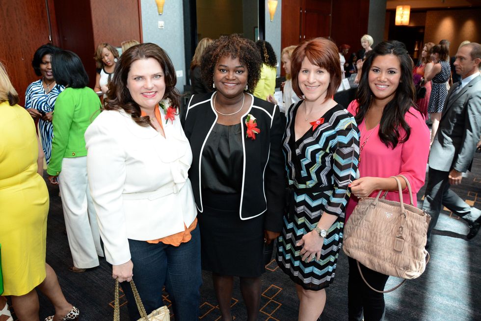 5605 Shelly Millwee, from left, Vivian Mora, Stacy Humphries and Jamie Sava at the Girls Inc. luncheon May 2014