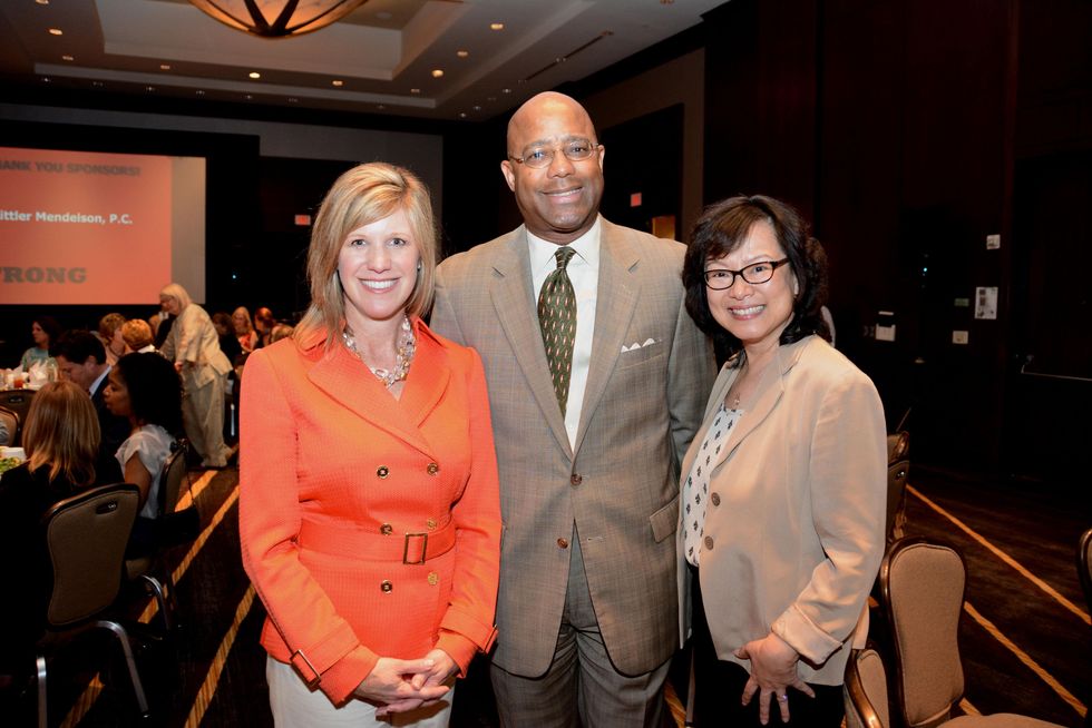 5611 Alicia Blaszak, from left, Michael Pearson and Chimei Lin at the Girls Inc. luncheon May 2014