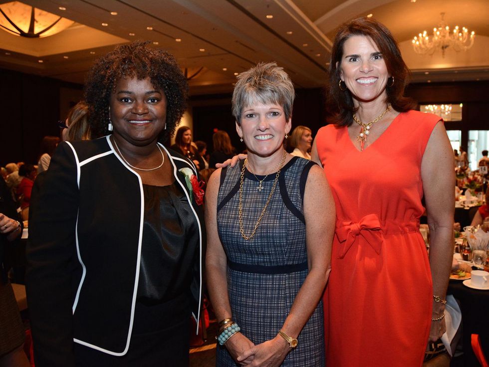 5623 Vivian Mora, from left, Twila Carter and Lisa Malosky at the Girls Inc. luncheon May 2014