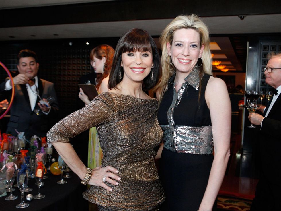 57 Sandra Porter, left, and Mauri Oliver at the STAGES Xanadu Gala April 2014