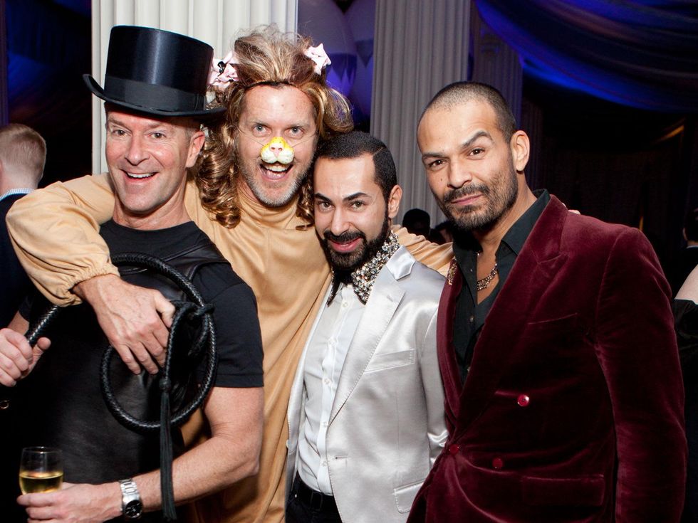 57 Shannon Hall, from left, Marcus Sloan, Fady Armanious and Todd Ramos at the Night Circus party January 2014